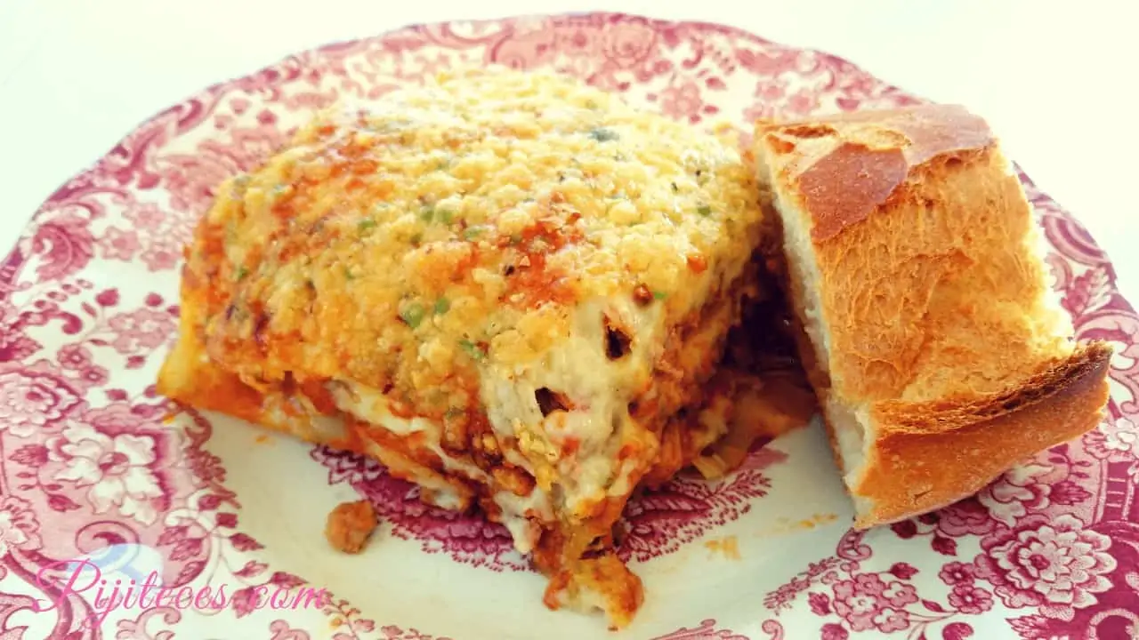 Porción de Lasaña boloñesa al horno